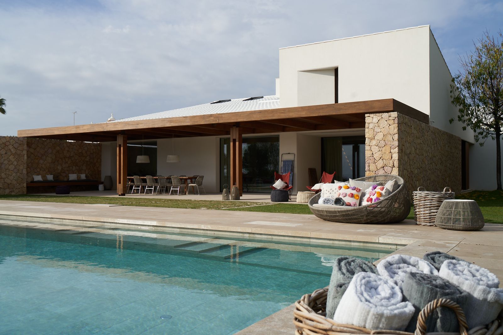 Villa facade and pool by day